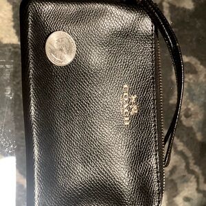Black coach corn purse in very good condition